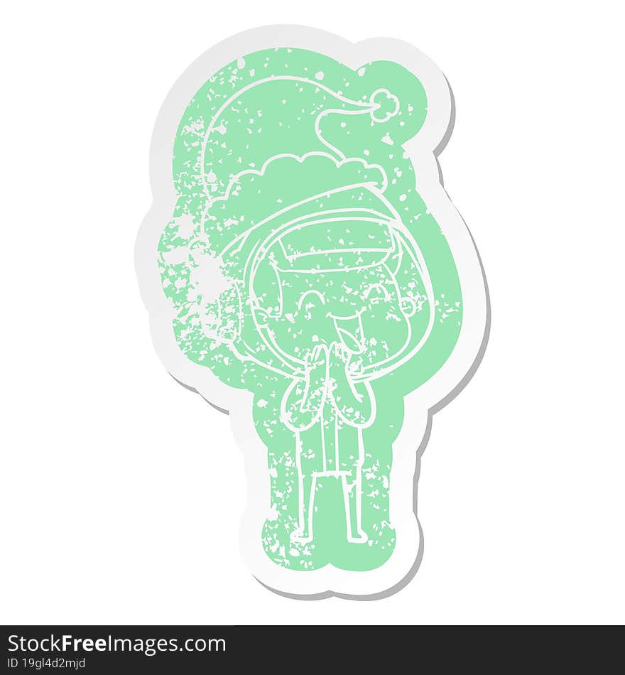 Happy Cartoon Distressed Sticker Of A Astronaut Wearing Santa Hat