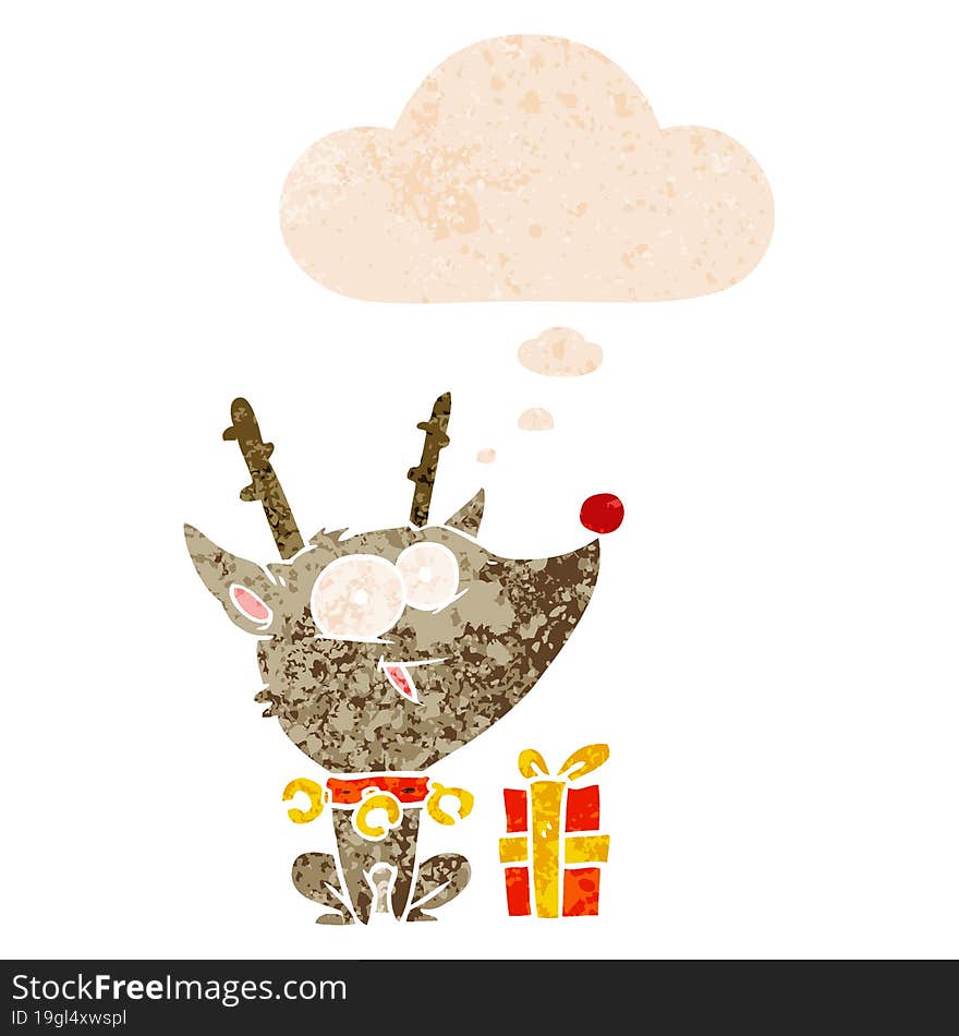 cartoon christmas reindeer and thought bubble in retro textured style