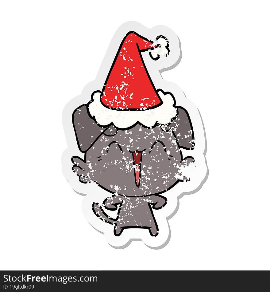 Happy Little Dog Distressed Sticker Cartoon Of A Wearing Santa Hat