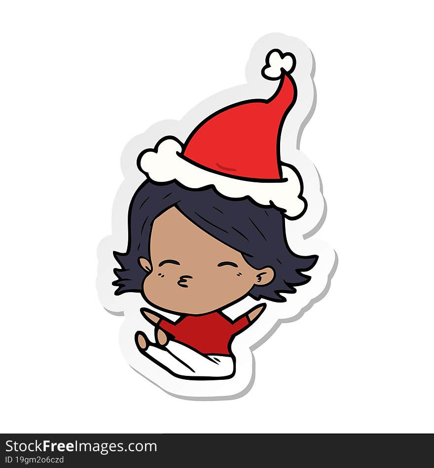 sticker cartoon of a woman sitting wearing santa hat