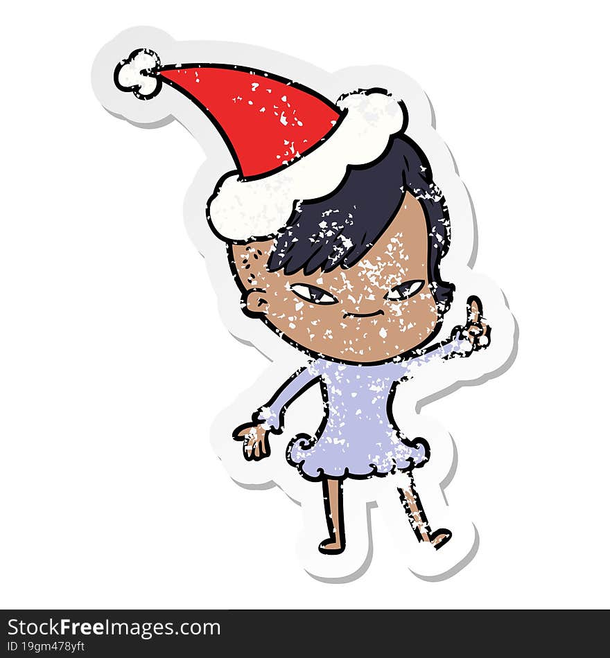 cute distressed sticker cartoon of a girl with hipster haircut wearing santa hat