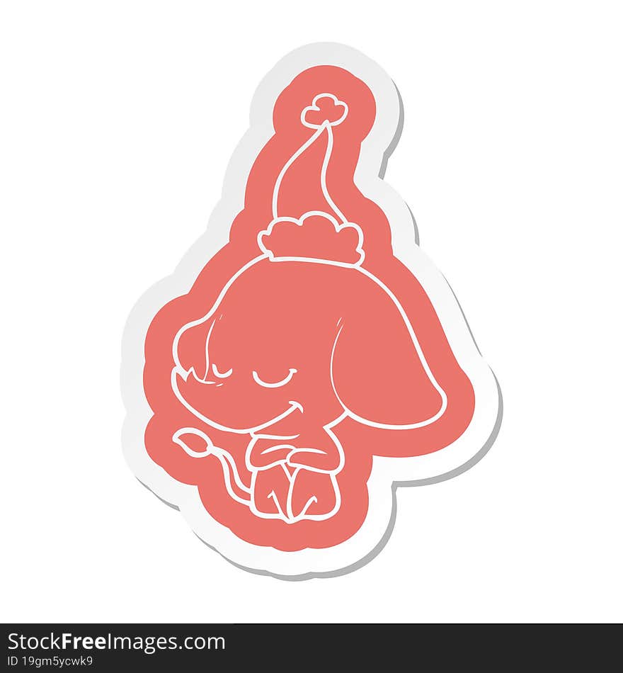 cartoon  sticker of a smiling elephant wearing santa hat