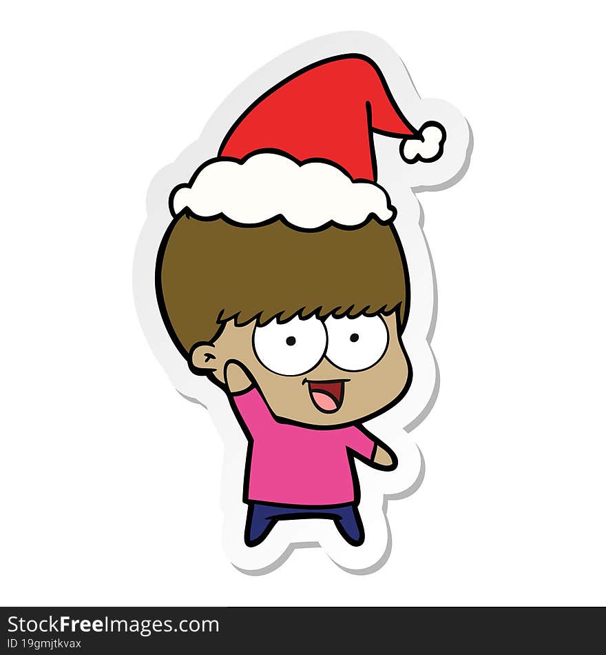 happy sticker cartoon of a boy waving wearing santa hat