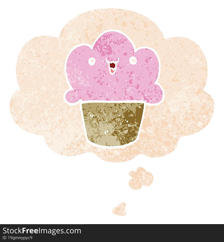 cartoon cupcake with face with thought bubble in grunge distressed retro textured style. cartoon cupcake with face with thought bubble in grunge distressed retro textured style