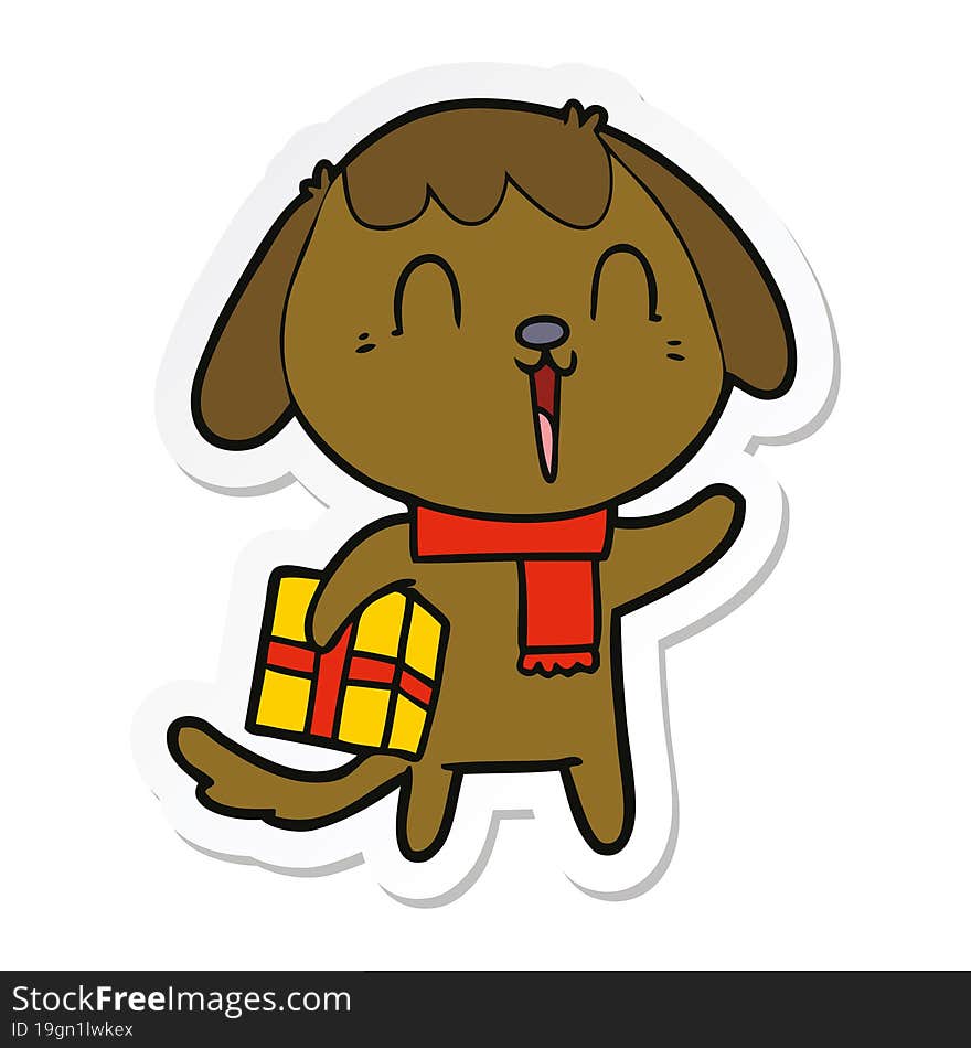 sticker of a cute cartoon dog with christmas present