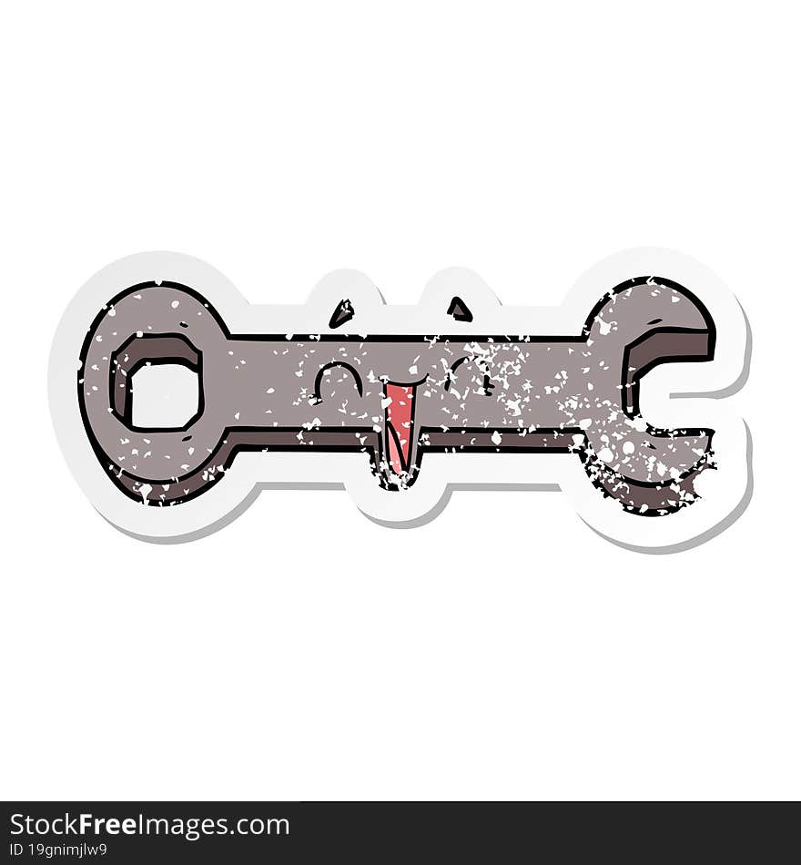 distressed sticker of a cartoon spanner