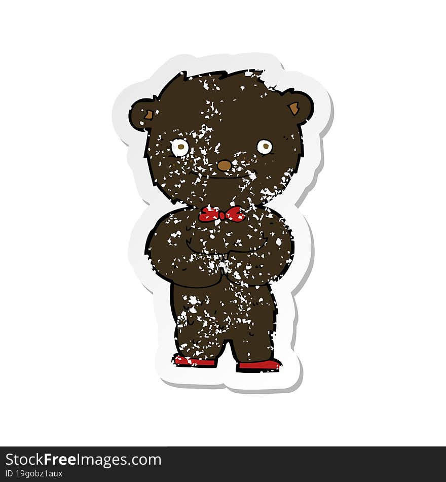 retro distressed sticker of a cartoon little black bear