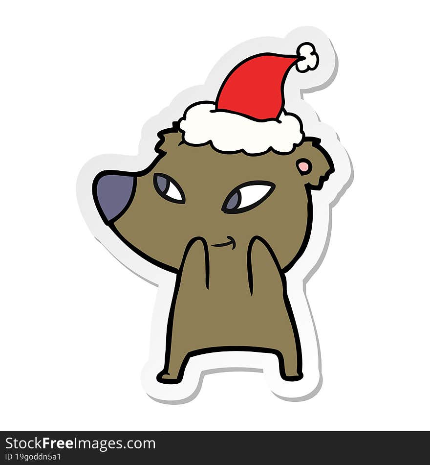 cute hand drawn sticker cartoon of a bear wearing santa hat. cute hand drawn sticker cartoon of a bear wearing santa hat