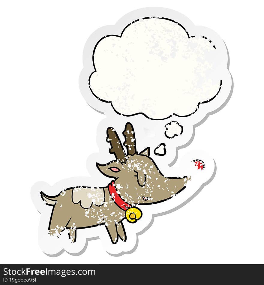 cartoon christmas reindeer and thought bubble as a distressed worn sticker