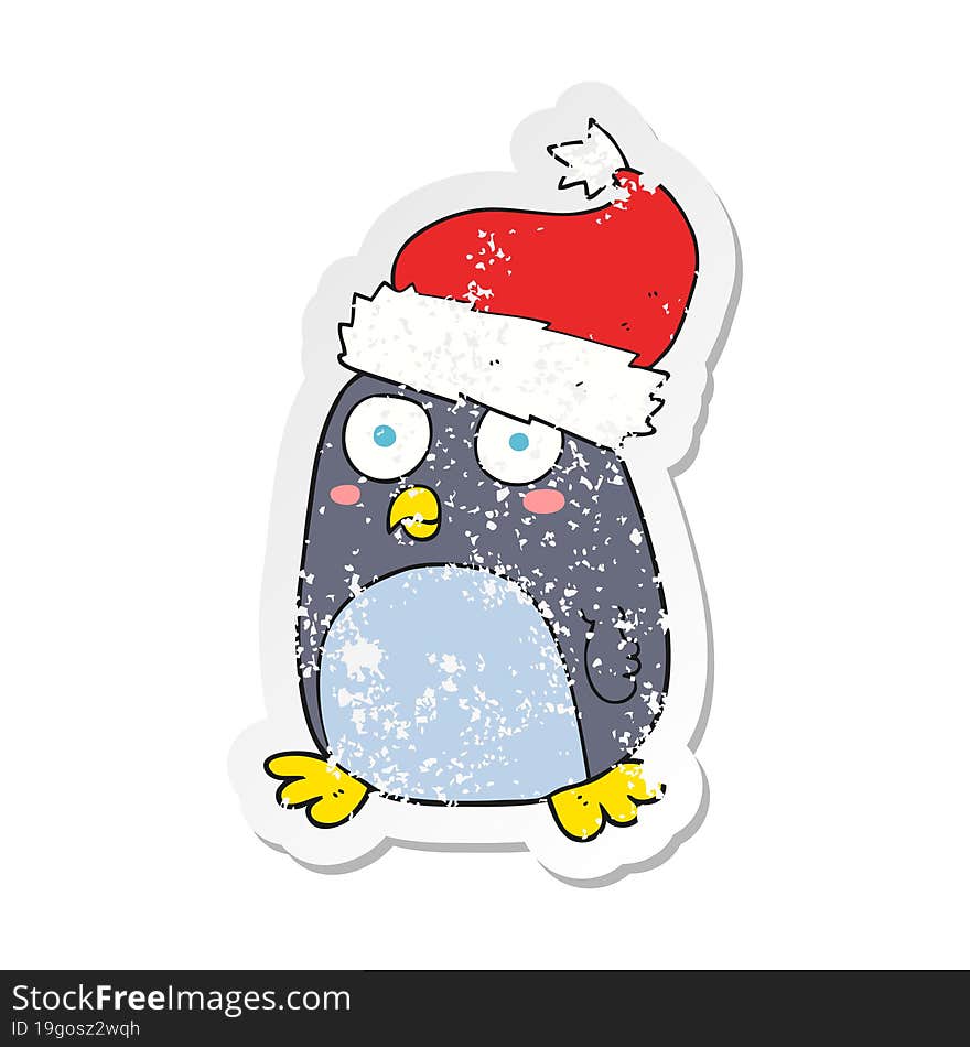 retro distressed sticker of a cartoon penguin in christmas hat