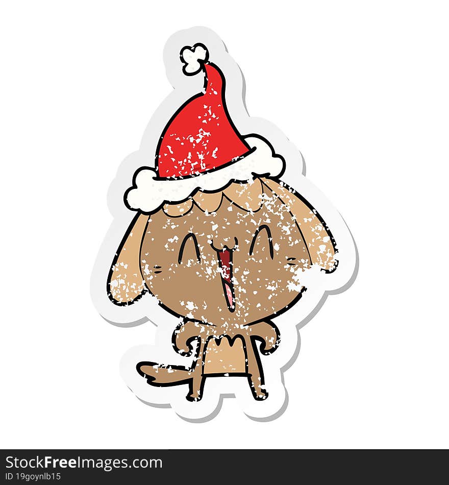 cute distressed sticker cartoon of a dog wearing santa hat