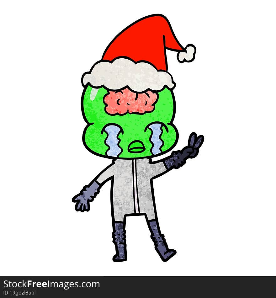 hand drawn textured cartoon of a big brain alien crying and giving peace sign wearing santa hat