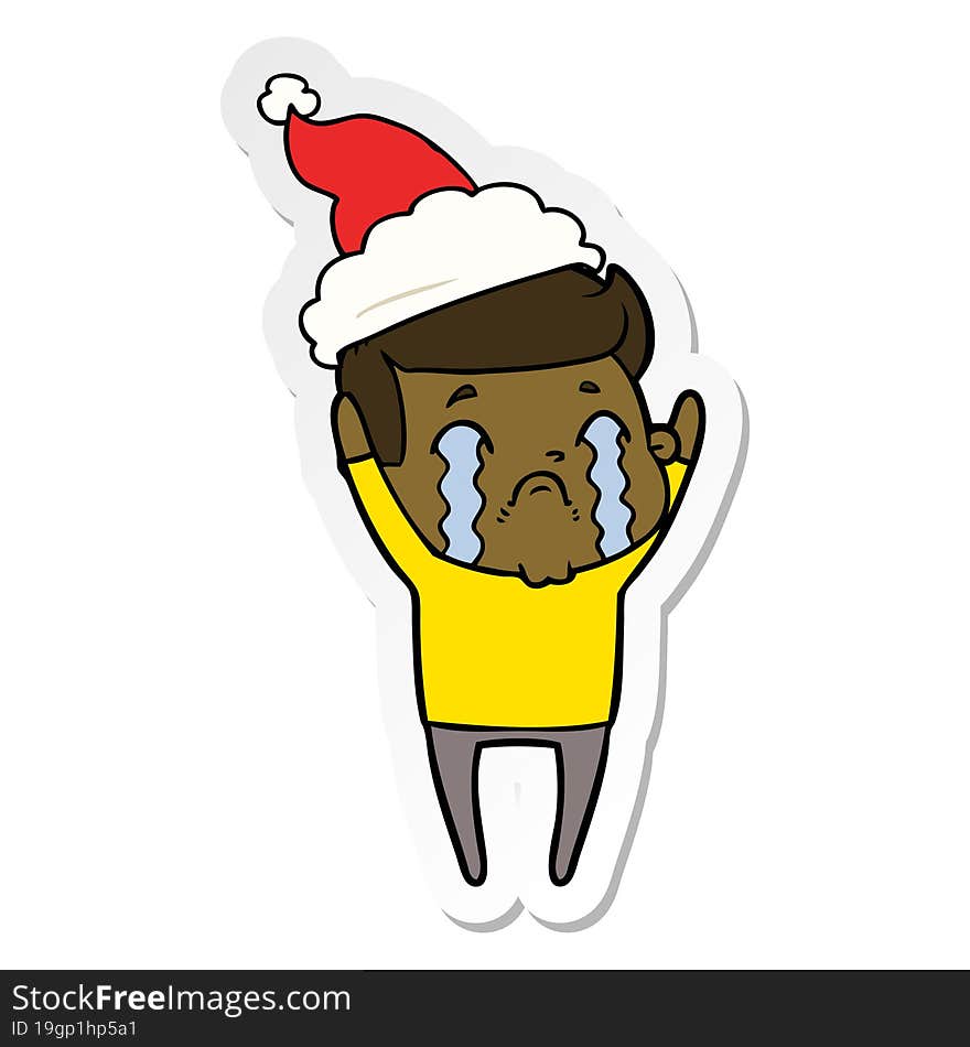 hand drawn sticker cartoon of a man crying wearing santa hat