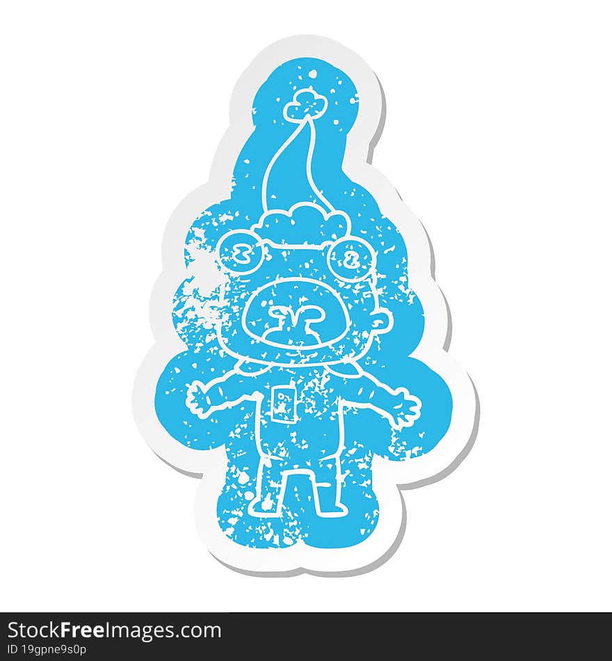 quirky cartoon distressed sticker of a weird alien communicating wearing santa hat