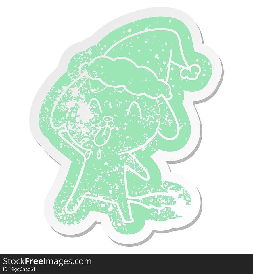 cute cartoon distressed sticker of a dog wearing santa hat