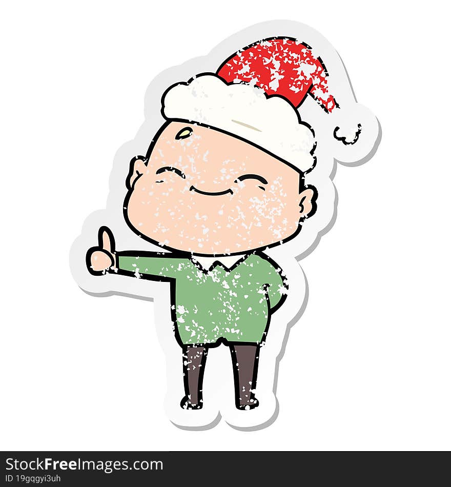 Happy Distressed Sticker Cartoon Of A Bald Man Wearing Santa Hat