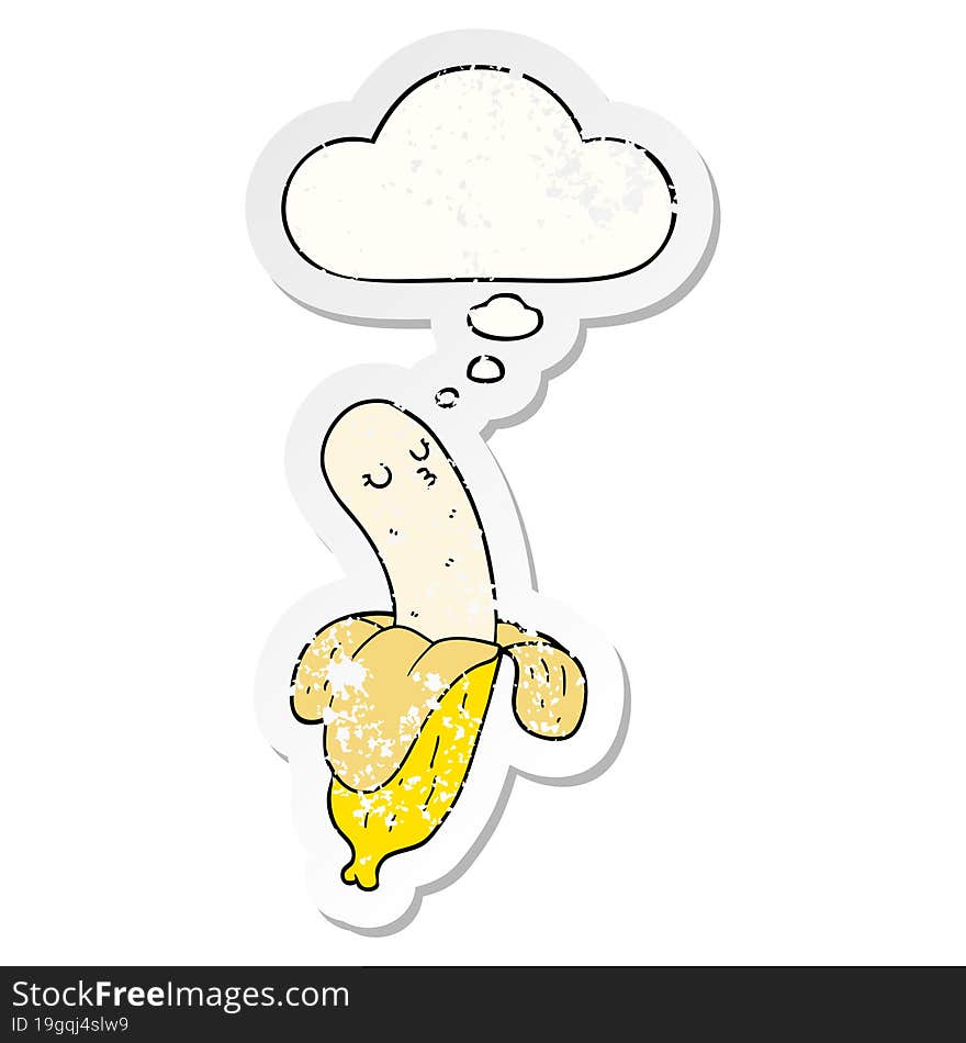 cartoon banana and thought bubble as a distressed worn sticker