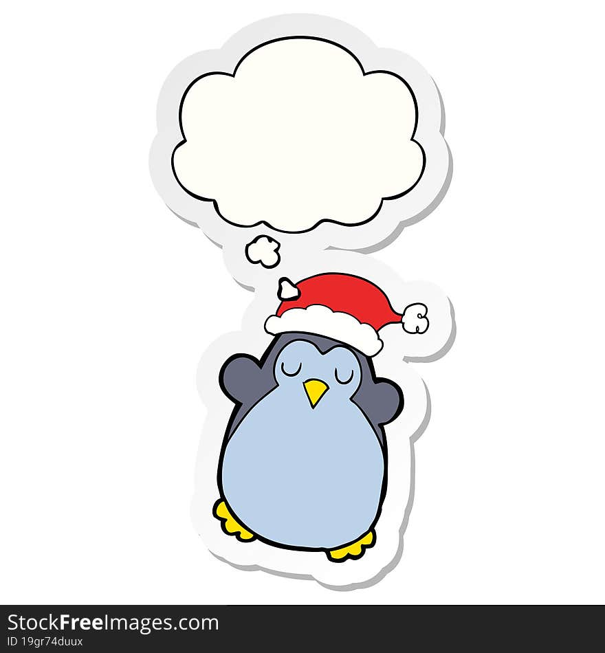 cute christmas penguin and thought bubble as a printed sticker