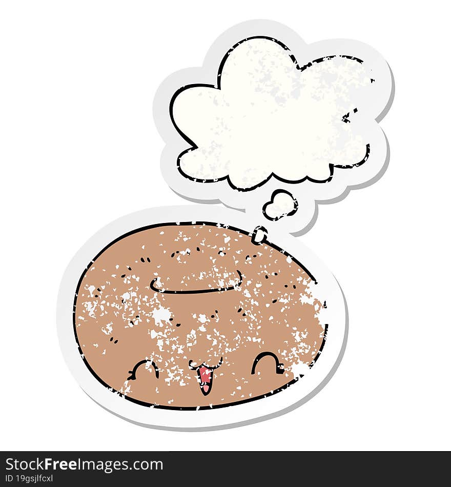 cute cartoon donut and thought bubble as a distressed worn sticker