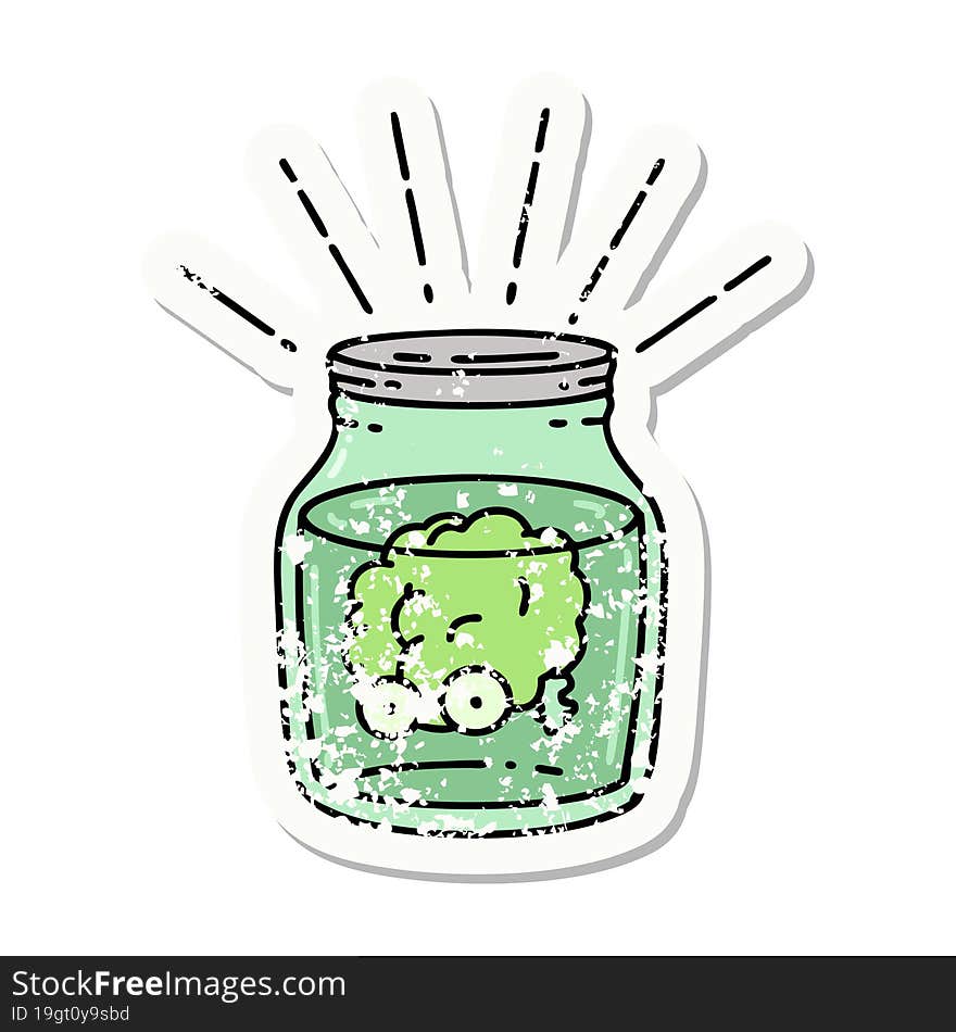 worn old sticker of a tattoo style brain in jar. worn old sticker of a tattoo style brain in jar