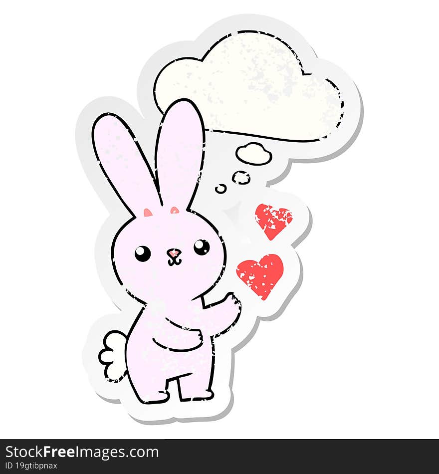 cute cartoon rabbit with love hearts with thought bubble as a distressed worn sticker