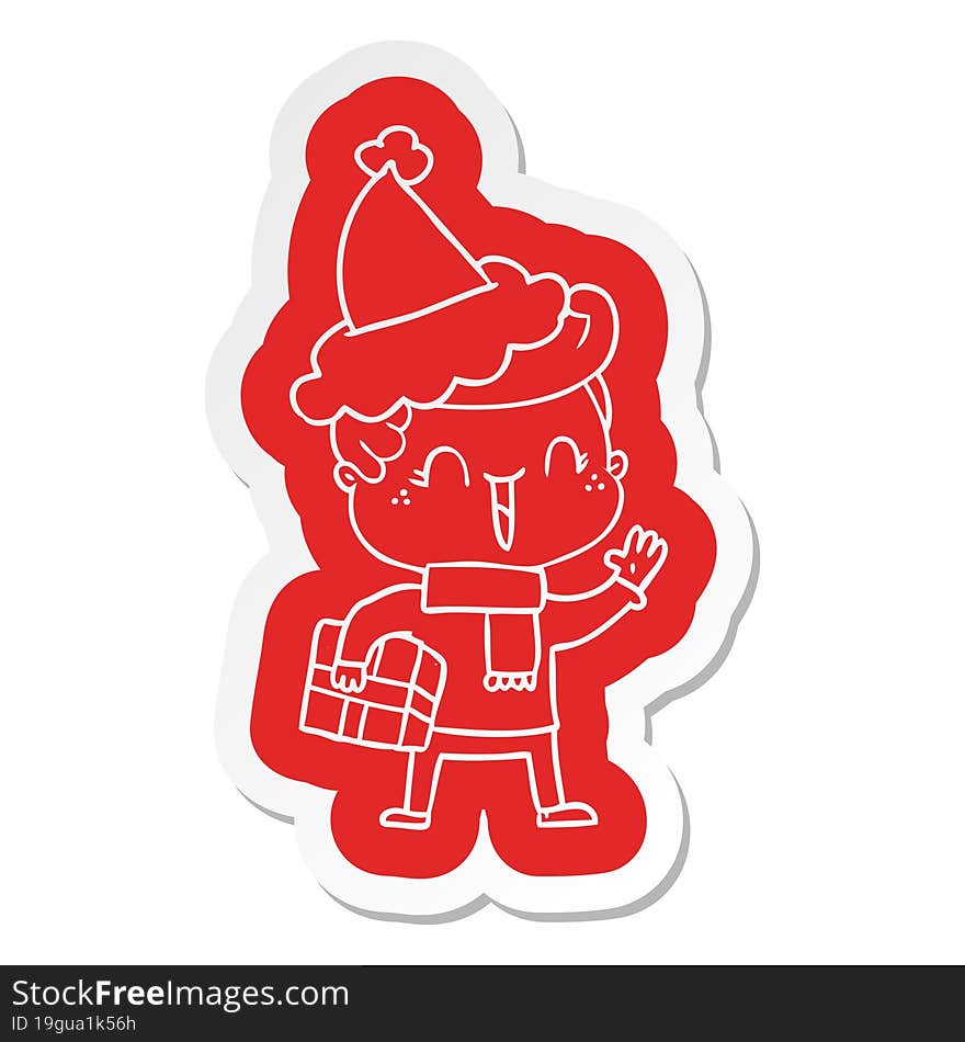 cartoon  sticker of a laughing boy wearing santa hat