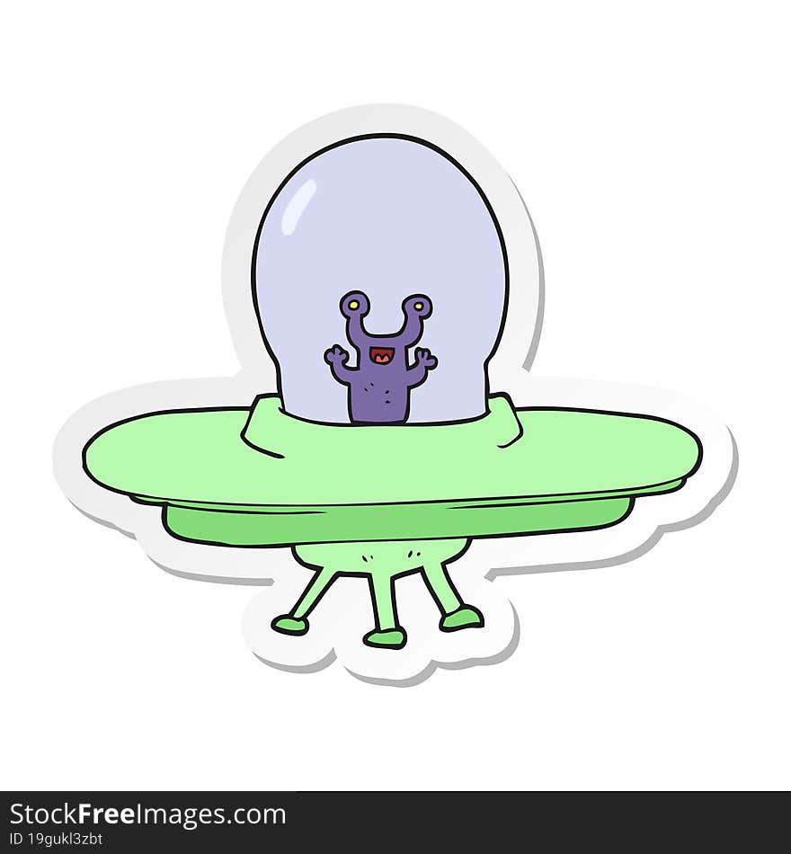 sticker of a cartoon alien spaceship