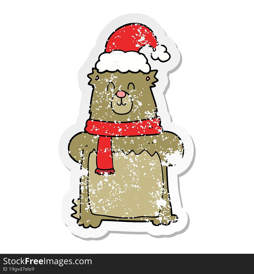 distressed sticker of a cartoon bear wearing christmas hat