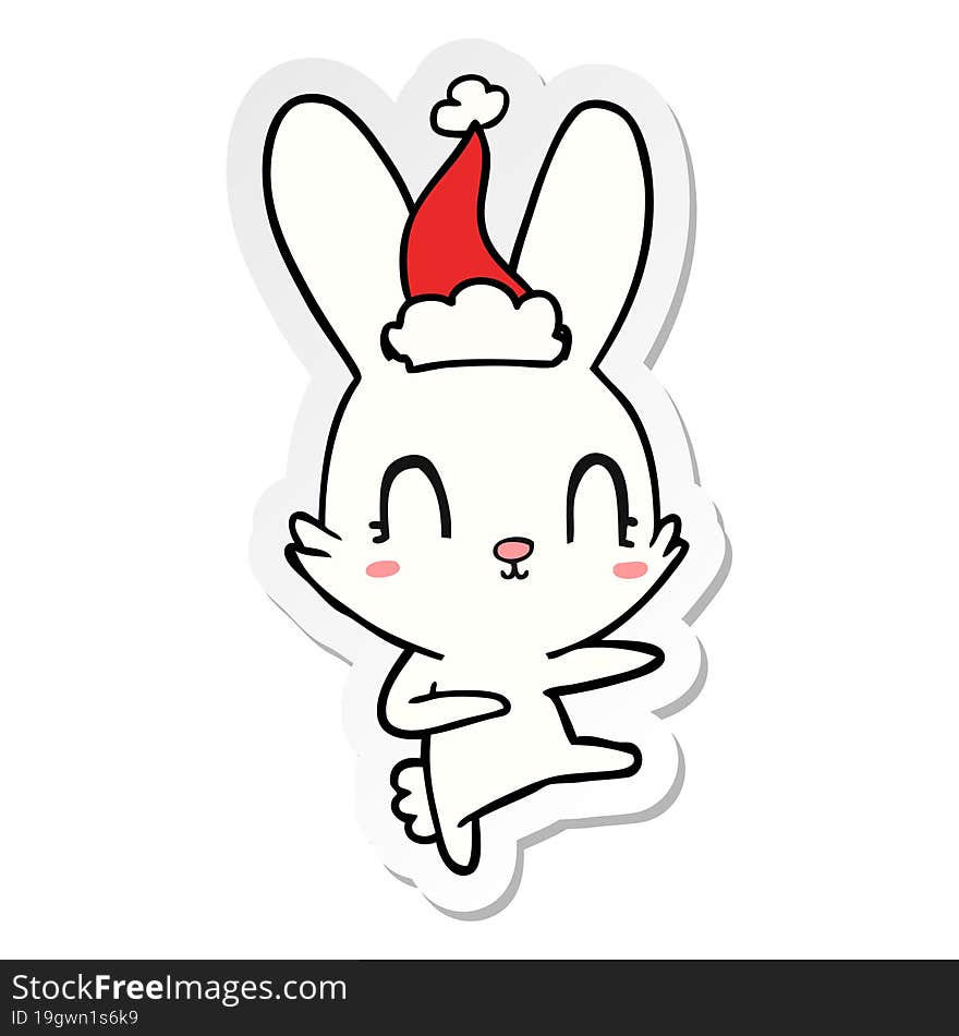 cute hand drawn sticker cartoon of a rabbit dancing wearing santa hat. cute hand drawn sticker cartoon of a rabbit dancing wearing santa hat