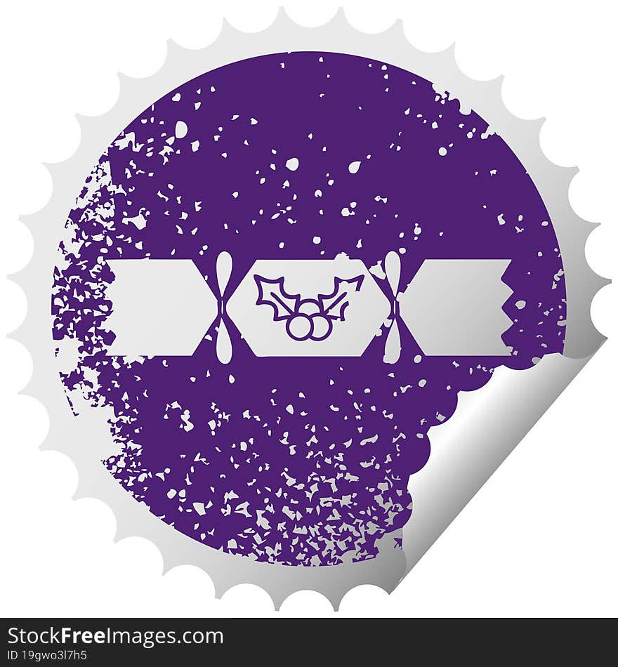 distressed circular peeling sticker symbol of a christmas cracker