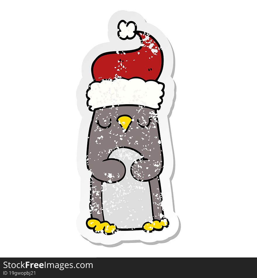 distressed sticker of a cartoon christmas penguin