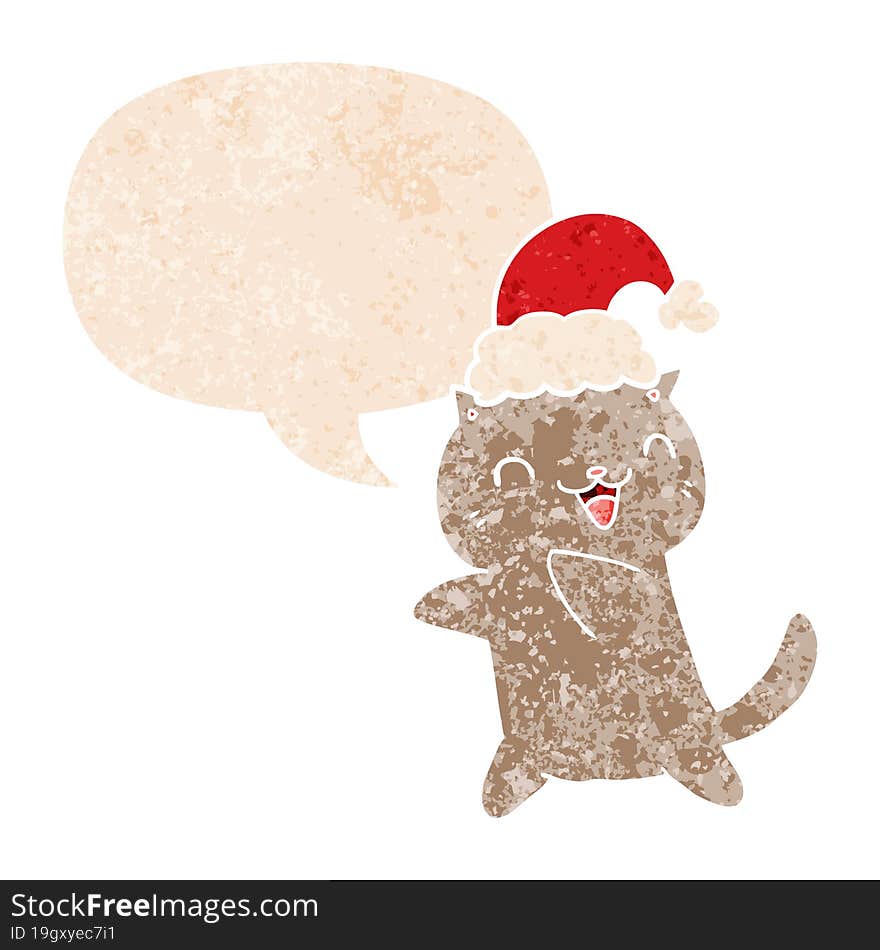 cute cartoon christmas cat and speech bubble in retro textured style