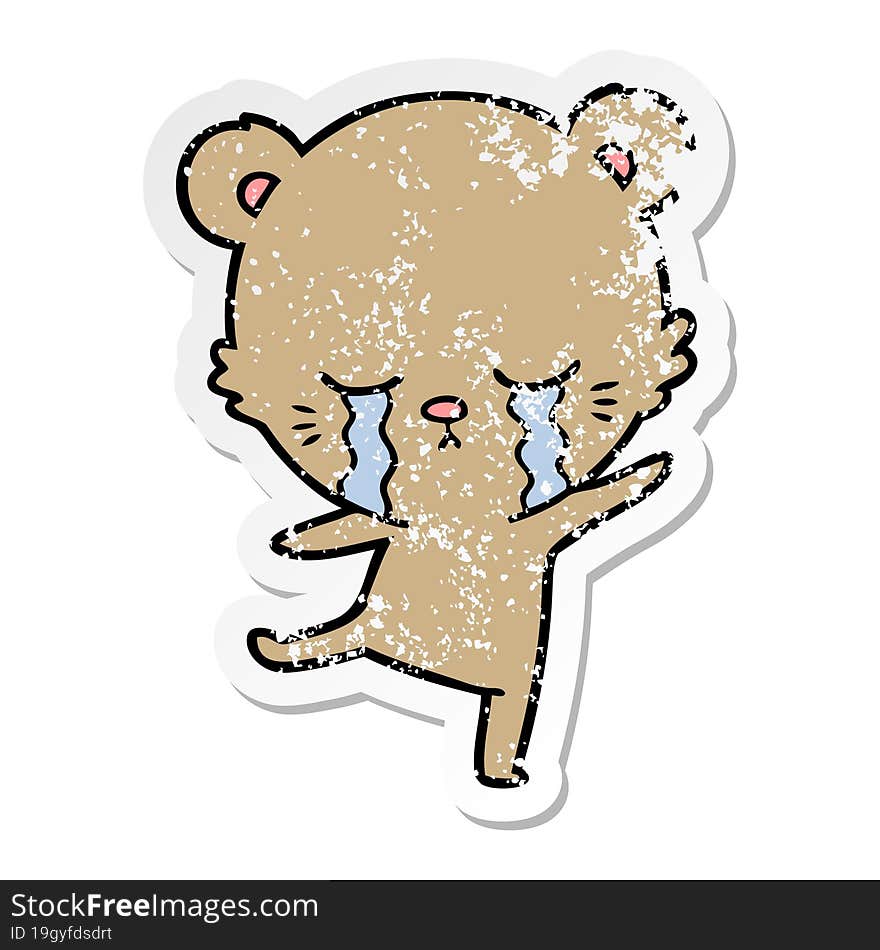 distressed sticker of a crying cartoon bear balancing