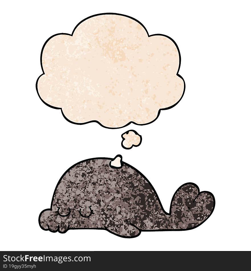 cartoon seal and thought bubble in grunge texture pattern style