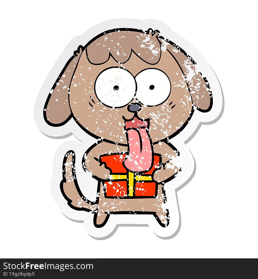 distressed sticker of a cute cartoon dog with christmas present