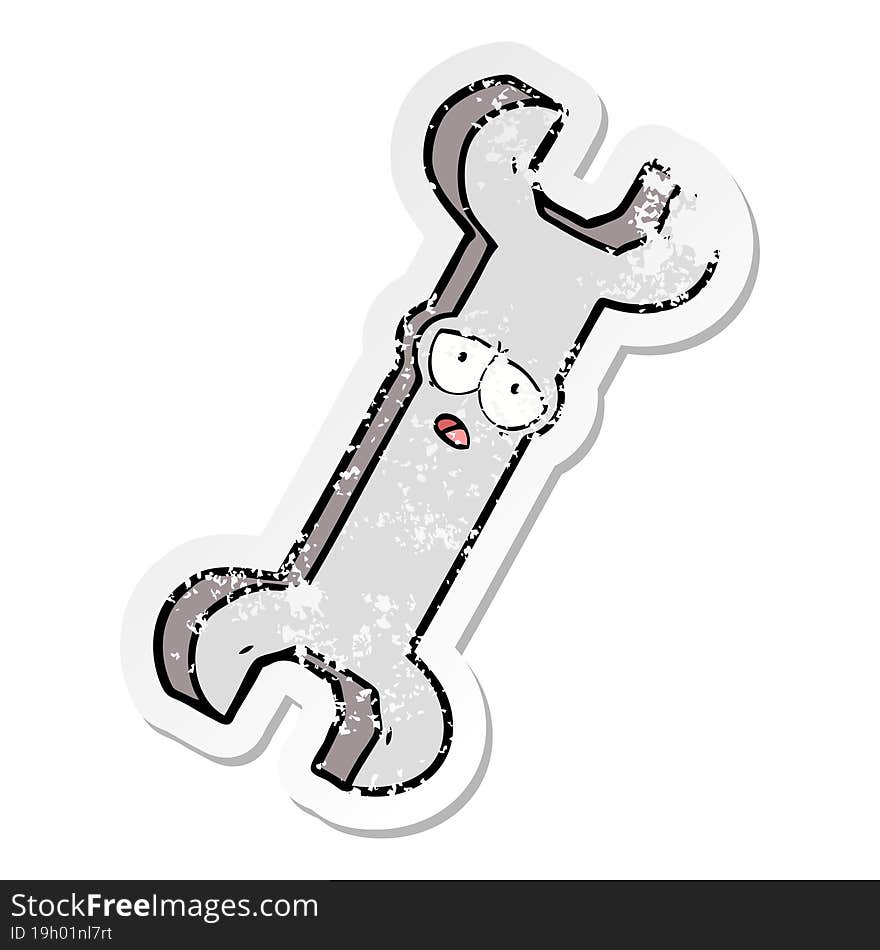 distressed sticker of a cartoon spanner