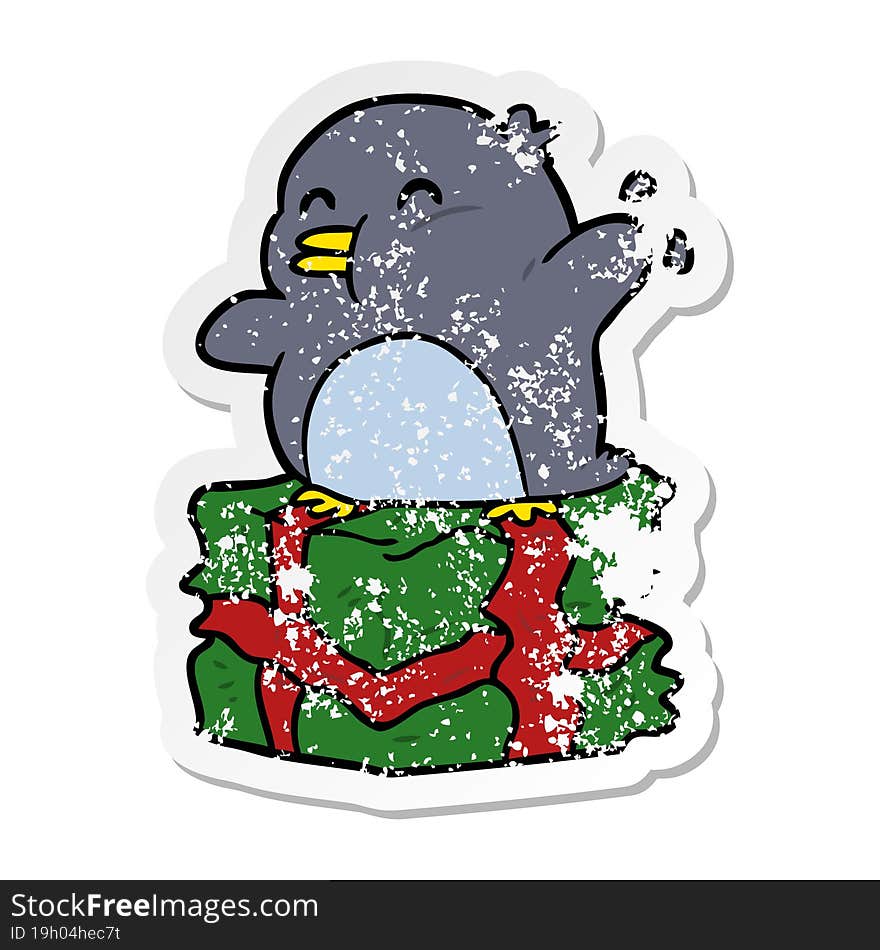 distressed sticker of a cartoon penguin on present