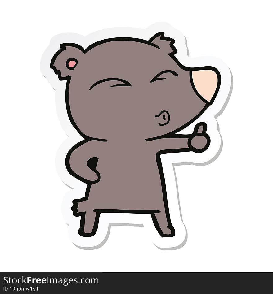 sticker of a cartoon whistling bear