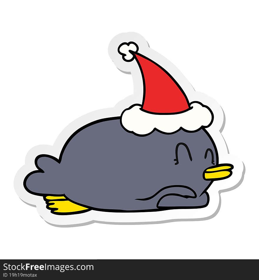 Penguin Lying On Belly Wearing Santa Hat