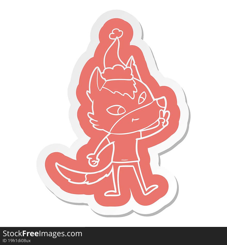 Friendly Cartoon  Sticker Of A Wolf Giving Peace Sign Wearing Santa Hat