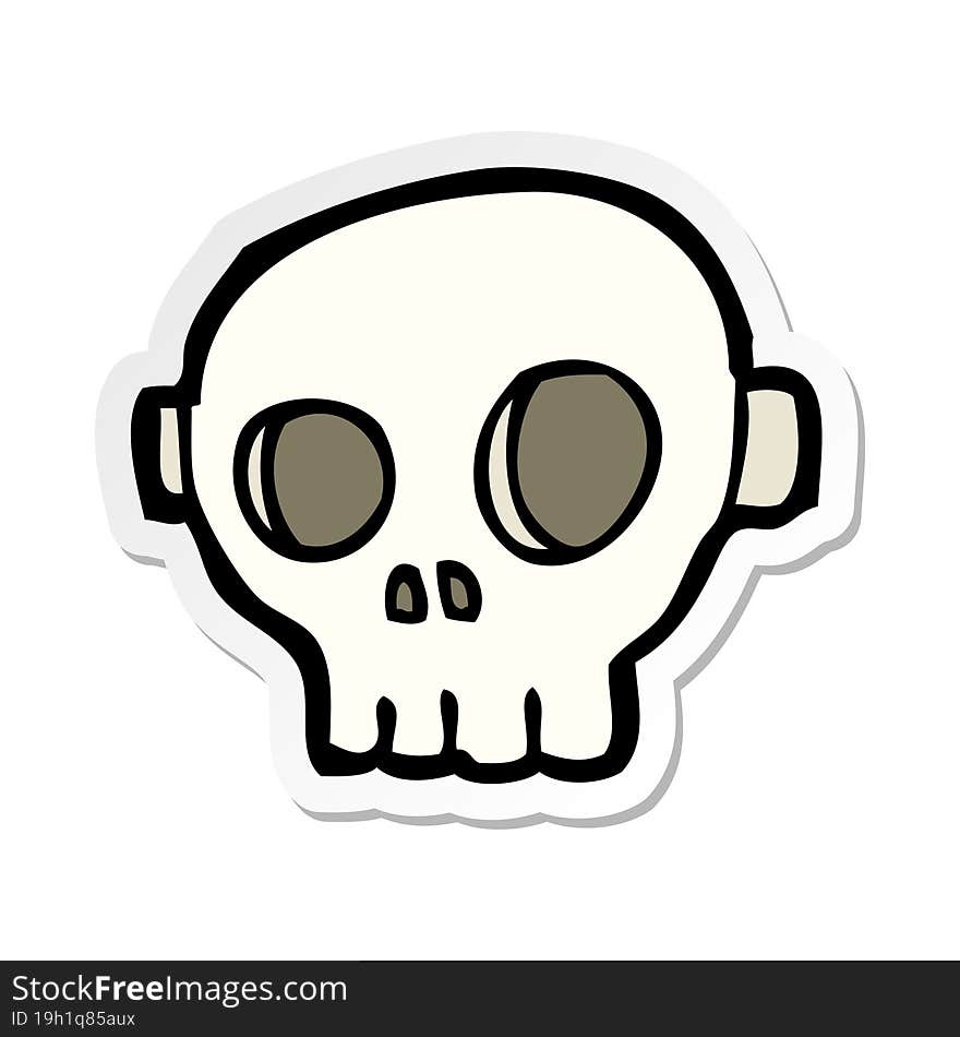 sticker of a cartoon spooky skull mask