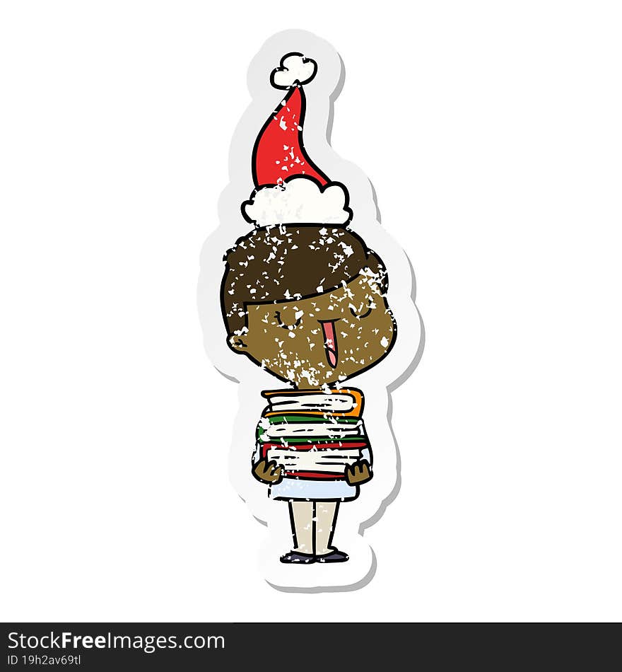 Distressed Sticker Cartoon Of A Happy Boy With Stack Of Books Wearing Santa Hat