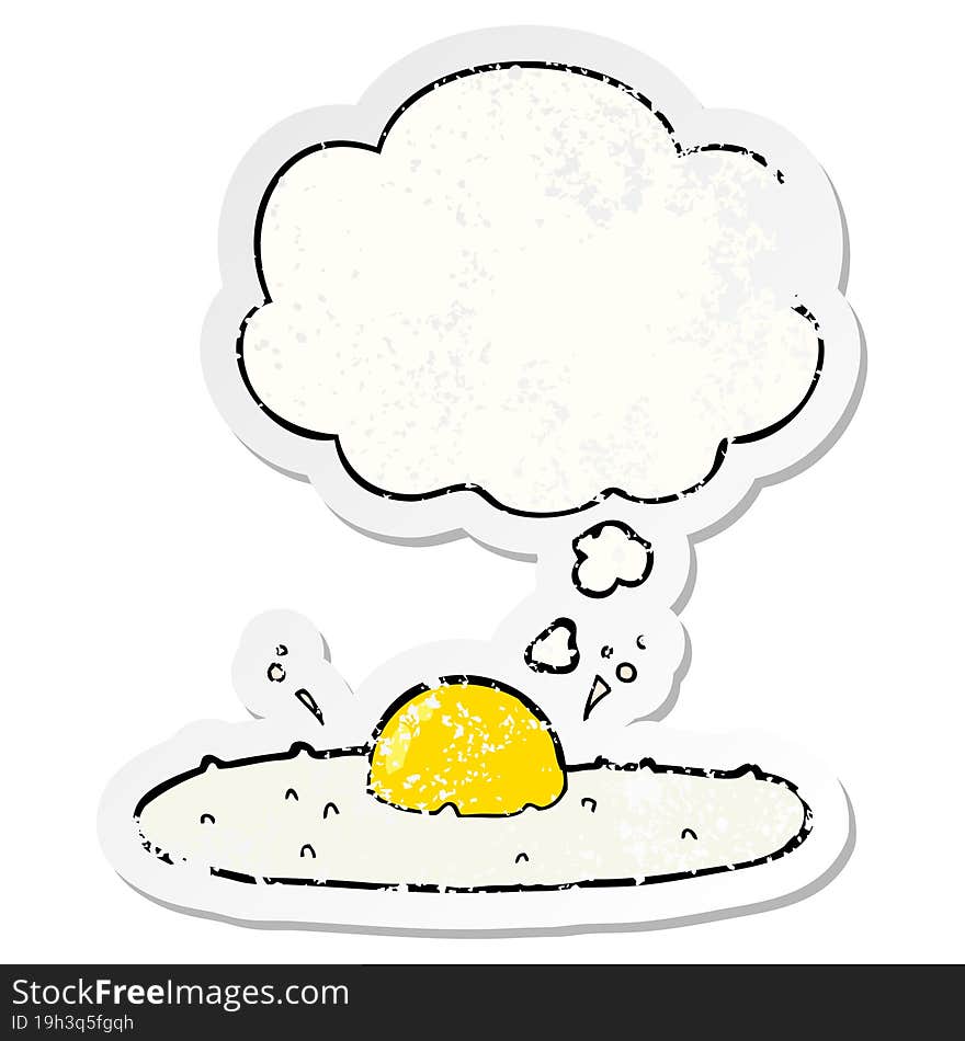 cartoon fried egg with thought bubble as a distressed worn sticker