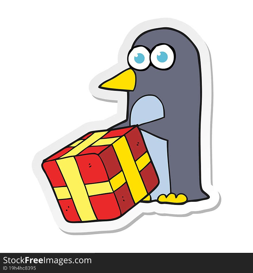 sticker of a cartoon penguin with christmas present