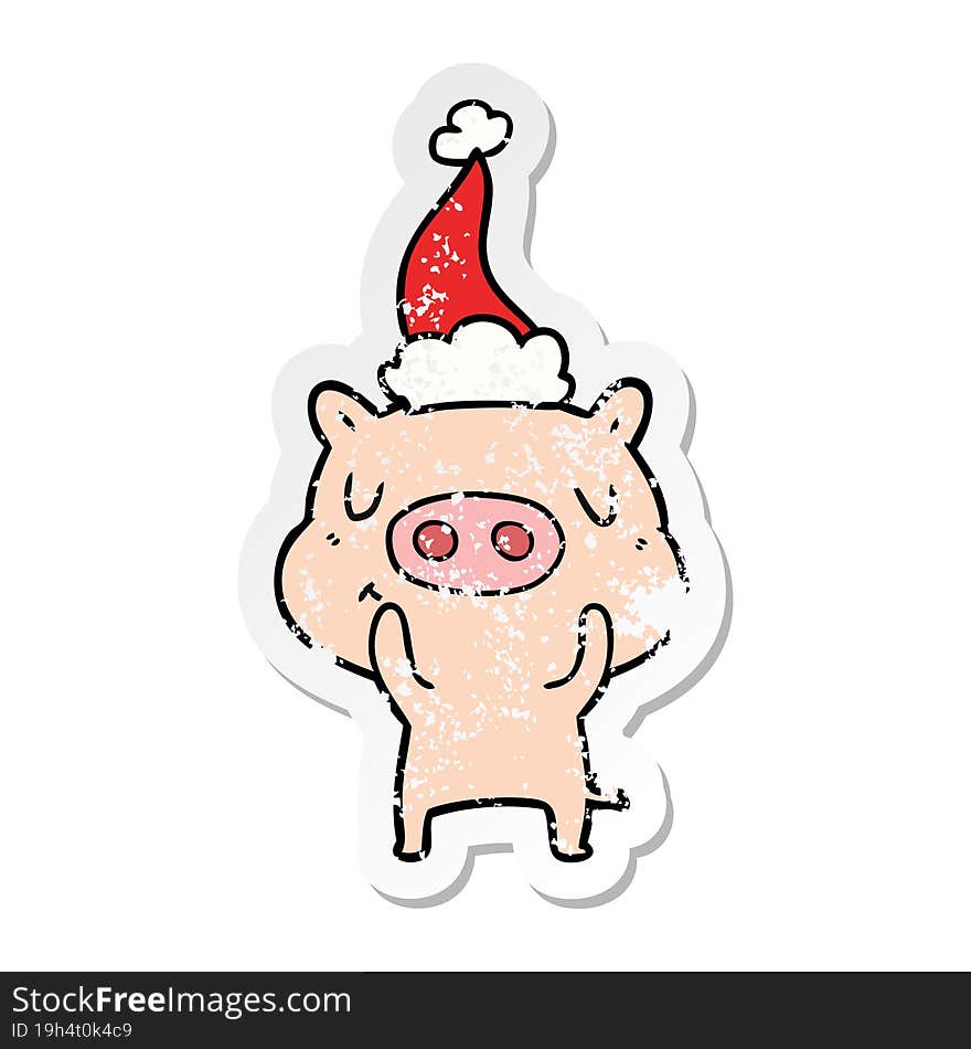 distressed sticker cartoon of a content pig wearing santa hat