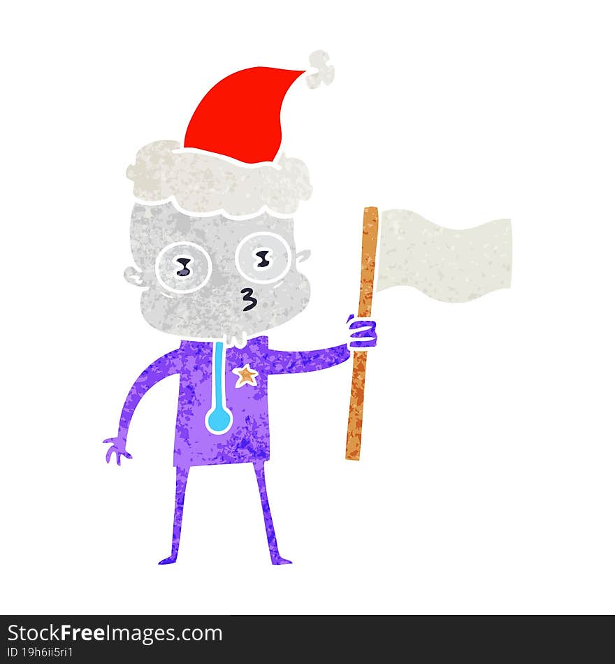 retro cartoon of a weird bald spaceman with flag wearing santa hat