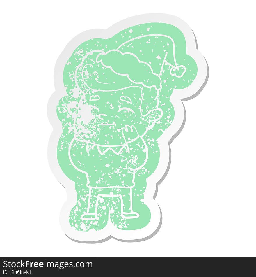 happy cartoon distressed sticker of a man wearing santa hat