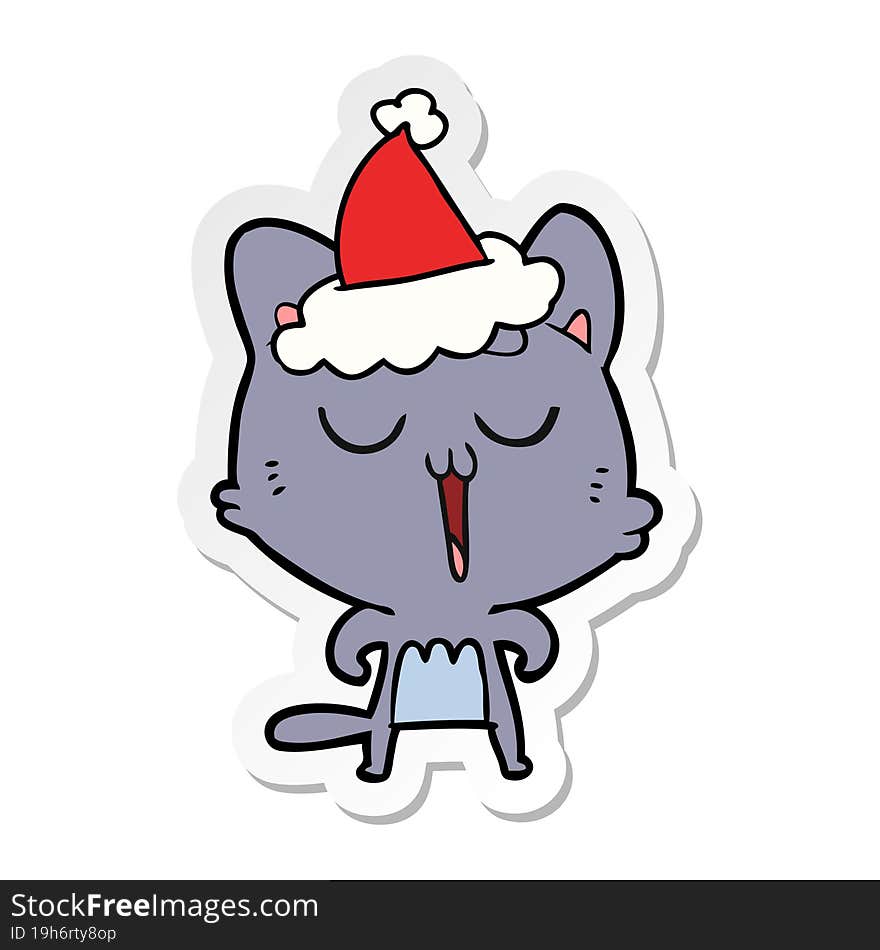 sticker cartoon of a cat singing wearing santa hat