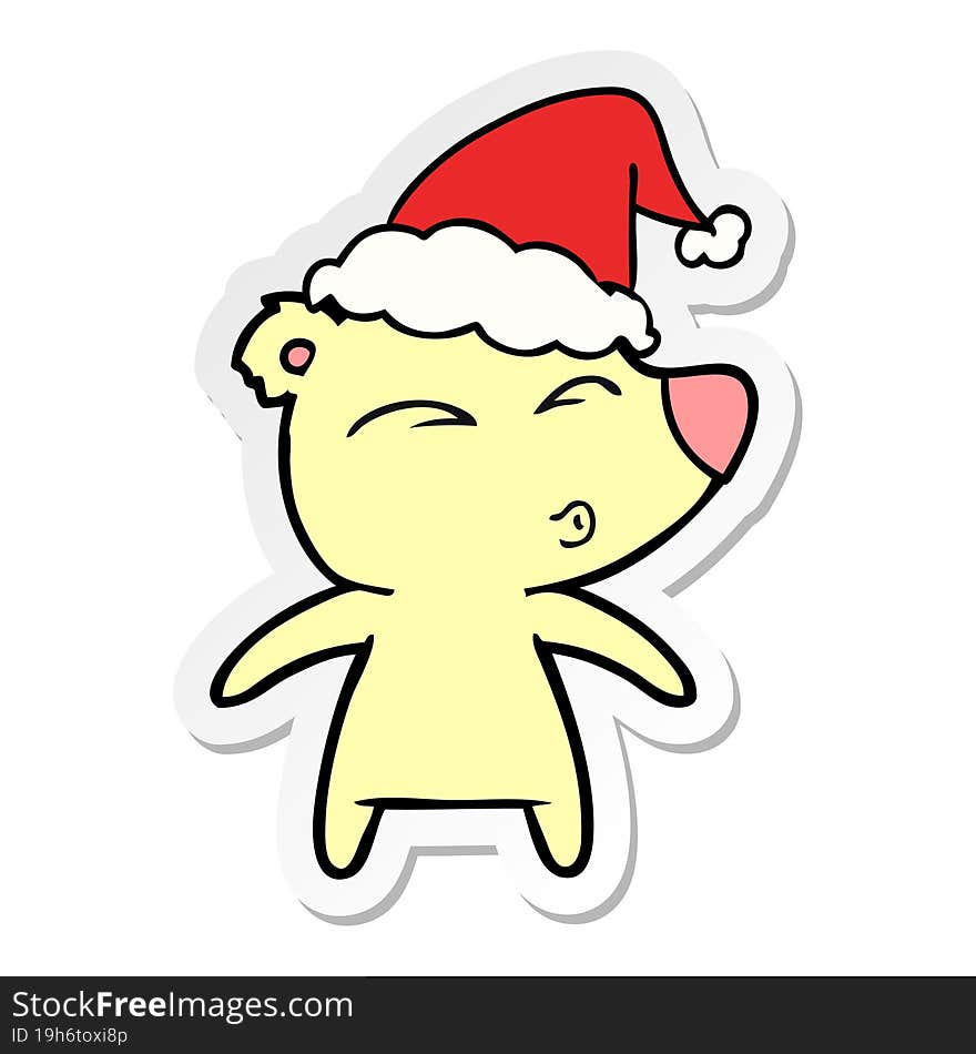 sticker cartoon of a whistling bear wearing santa hat