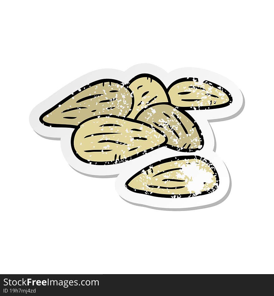 distressed sticker of a cartoon almonds